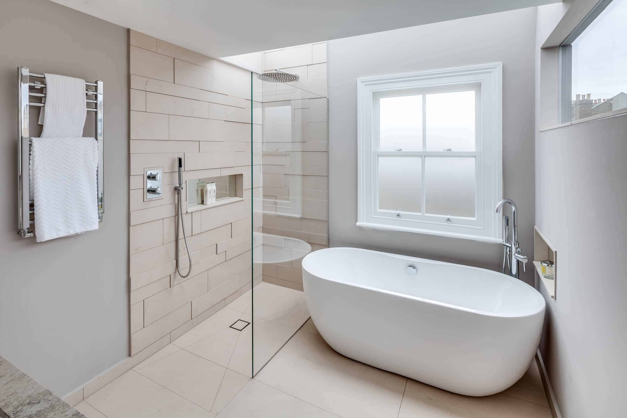 Modern tub to shower conversions by Elite Bath Solutions